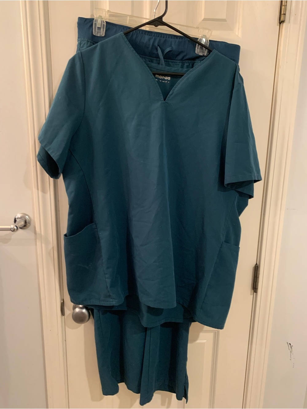 Mandela Scrub set in dark green.
